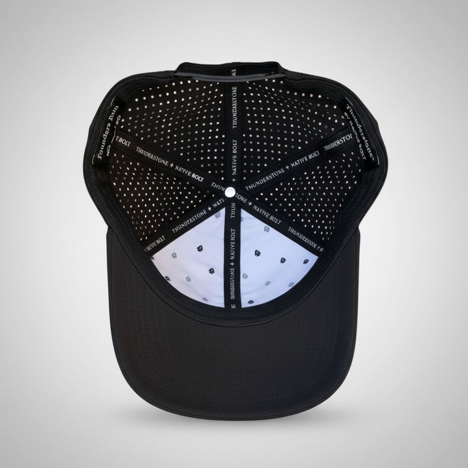 Black baseball cap shown from the back, featuring a black mesh back with silver studs and a white underside with small black and silver dots. The word 'THIEVETONCE' is printed repeatedly on the black underbrim.